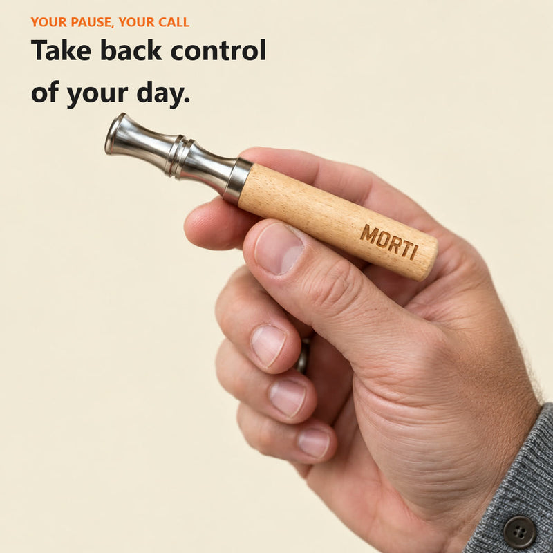 [show:starter-kit/natural,best-value-kit/natural] Take back control of your day: a hand holding the Natural Wood Morti pen