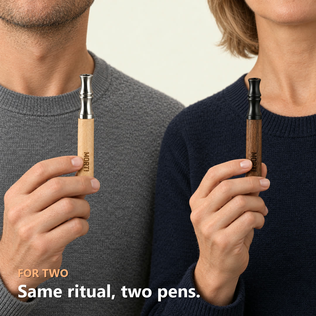 Same ritual, two pens: two people, each holding their own Morti pen